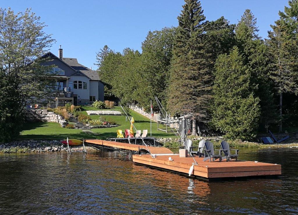 Luxury home on Ottawa River with custom steel floating dock