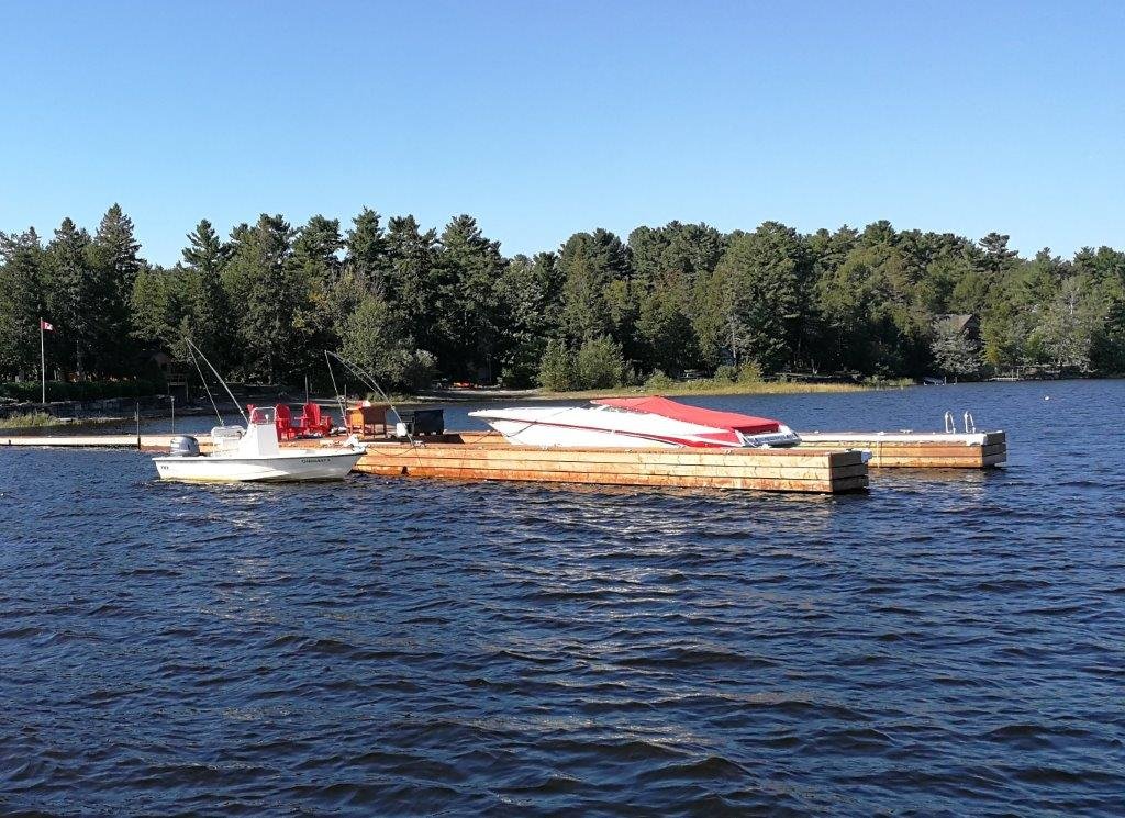 Integrated boat lift floating section